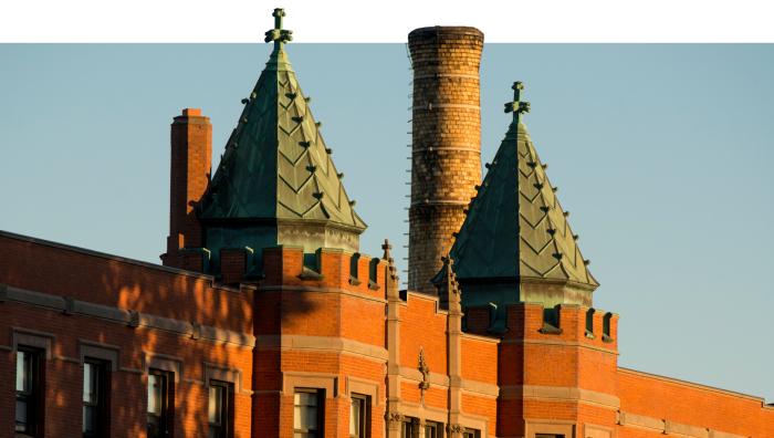 Alumni Hall during a sunset