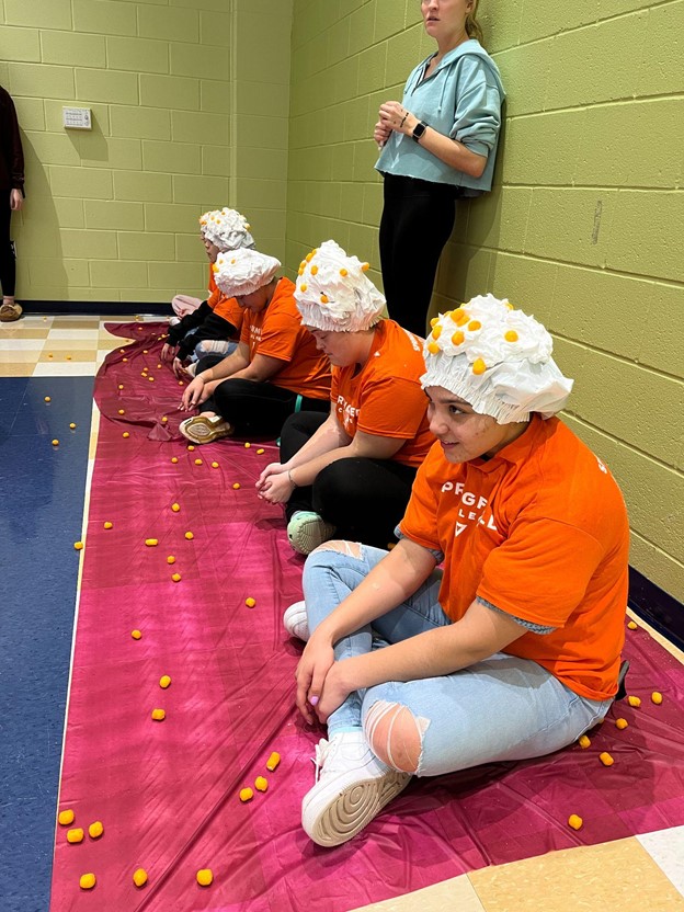 Springfield College Students playing with local elementry school students
